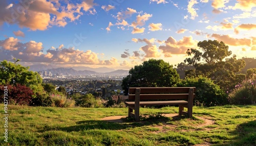 A serene outdoor scene features a wooden bench overlooking a city skyline. The sky is filled with clouds illuminated by the setting sun