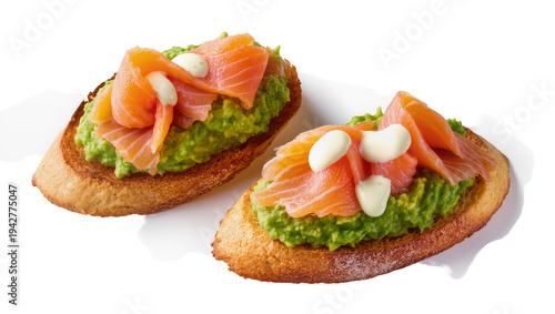 фотографія Isolated bruschetta toasts with smoked salmon, avocado and sauce for appetizers