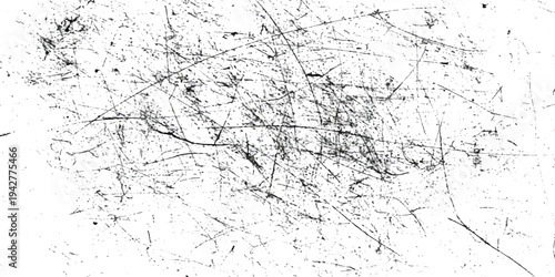 Abstract black and white grunge texture background featuring scratches, specks, and distressed elements