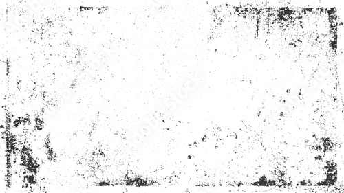 Grungy textured background with scattered black speckles and distressed edges on a white surface grunge