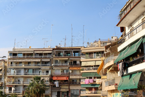 Apartment facades in Thessaloniki Greece August 2024 Urban residential buildings and colorful balconies