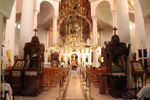 Tableau sur toile Interior of Saint Paul Church August 2024 Golden chandelier and wooden iconostas