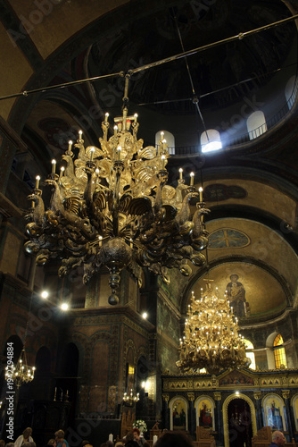 Hagia Sophia Thessaloniki ornate chandeliers August 2024 interior with mosaics and golden lamps