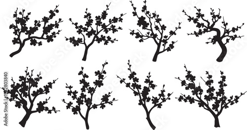 Set of six black tree silhouettes with blossoming flowers
