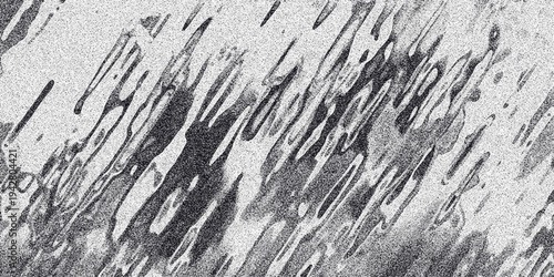 Abstract grayscale background with irregular diagonal shapes and a fine grainy texture, offering a unique visual element for creative design and artistic applications