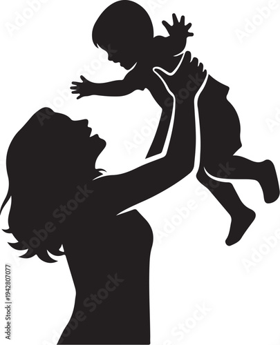 Silhouette of a mother lifting her happy little baby
