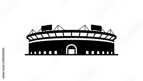 A large stadium with a roof and entrance gates stands empty outdoors