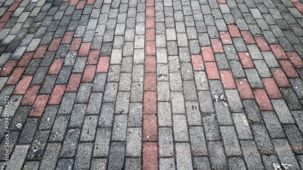 Fototapeta premium Pavement Pattern Brick Walkway Texture Outdoor Urban Design High Angle View Stone Path Background Ground Construction Surface with Geometric Red and Gray Block Paving and Perspective Backdrop