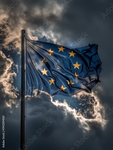 European union flag waving under dramatic sky