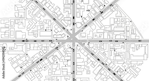 Aerial view of a city intersection with roads and buildings.