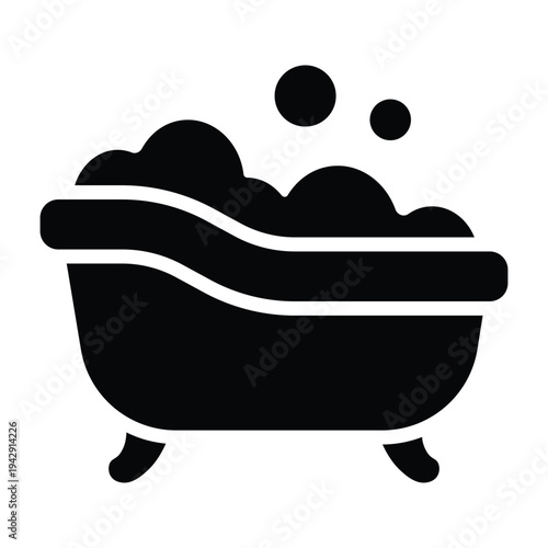 Solid black glyph illustration of bathtub with bubbles representing bathing and relaxation. Minimal silhouette design suitable for bathroom, wellness, and hygiene visuals.