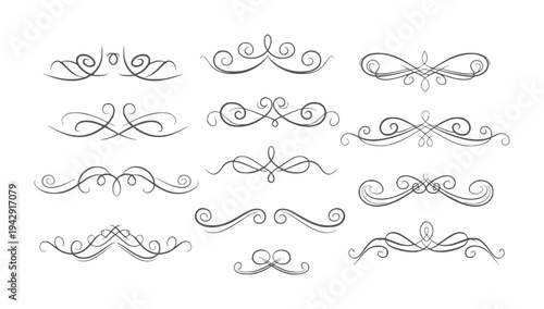 Collection of dark grey decorative flourishes and swirls white ornate vintage
