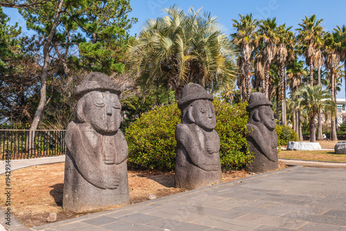 Dol hareubang, stone grandfather, a type of traditional volcanic rock statue from Jeju, South Korea