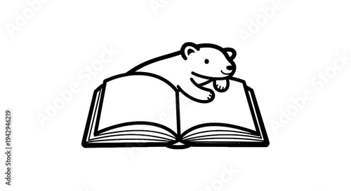 Bear reading an open book.