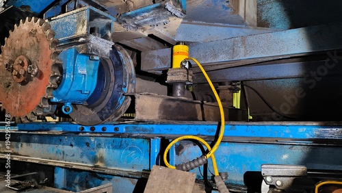 Close up of a hydraulic jack system lifting the main frame of a tripper conveyor.