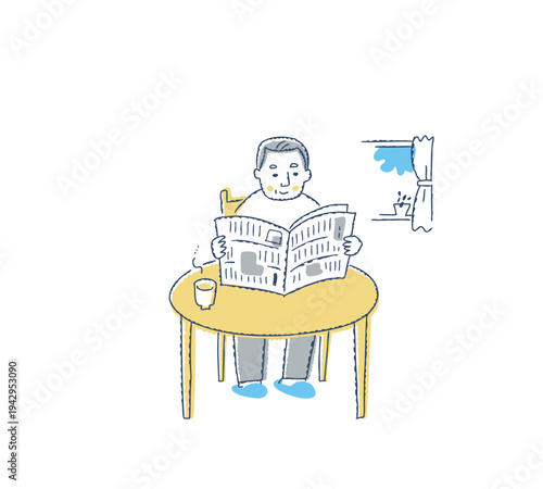 テーブルで新聞を読んでいるシニア男性