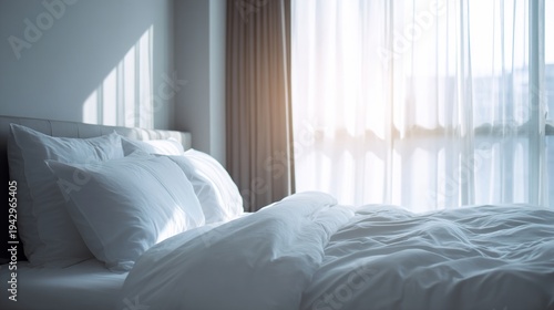guest. A serene hotel bedroom bathed in morning light, featuring a simple bed with crisp white linens and minimal decor. lifestyle magazines.