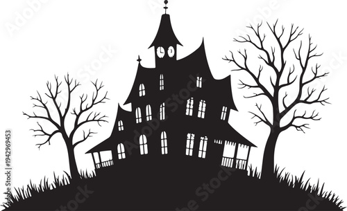 Spooky haunted house silhouette with bare trees and grass