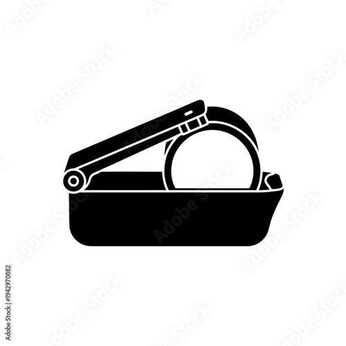 A collection of kitchen utensils and silver metal equipment is isolated on a white background with a black fashion accessory and a secure leather strap buckle