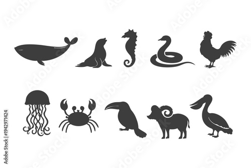 Animal silhouette icon set including whale, seal, seahorse, snake, rooster, jellyfish, crab, toucan, ram and pelican isolated