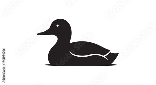 A black silhouette of a small duck floats calmly on a flat surface against a white background.