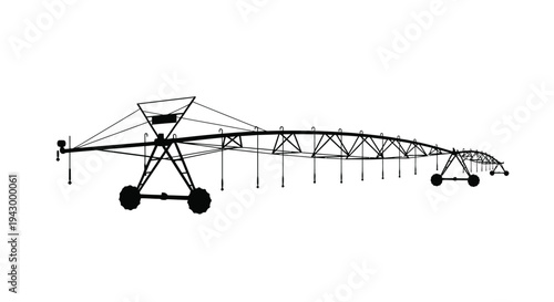 Center pivot irrigation system against a white background a dark silhouette