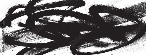 Abstract black brush strokes and splatter on a white, textured surface