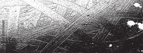 Textured black brush strokes and paint splatters on white background