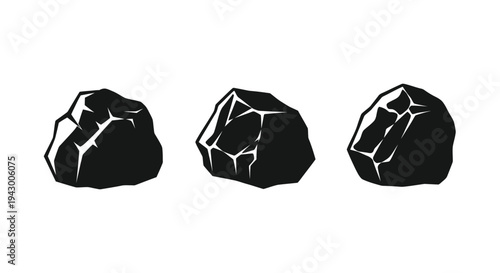 Three jagged rock formations displayed as a striking black silhouette