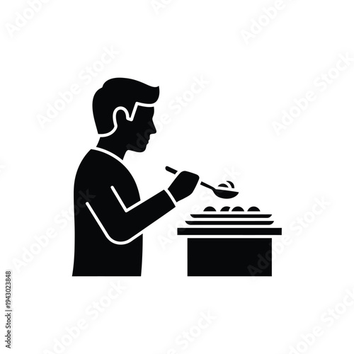 Man serving food at a buffet.