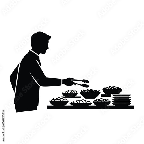 Man serving himself at a buffet table.