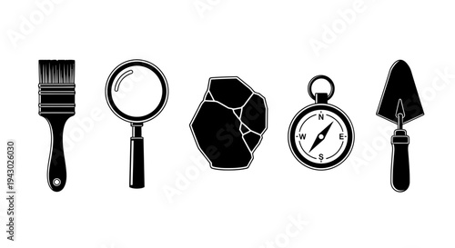 Set of five black and white icons representing classic tools and exploration items