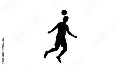 Silhouette of Man Heading Soccer Ball.