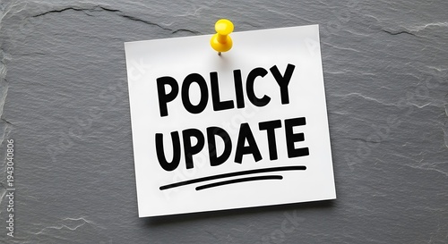 A Policy Update Notice On A Bulletin Board