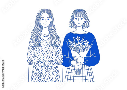 Two fashionable young women standing together, one holding a bouquet of flowers