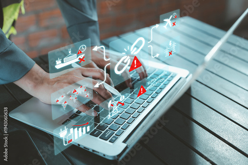 Fotografi Business analyst using laptop with virtual supply chain disruption, cancelled sh