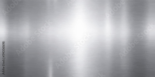 Brushed silver metal texture background features a polished stainless steel plate pattern with a shiny metallic surface and industrial chrome reflections on a grey aluminum backdrop