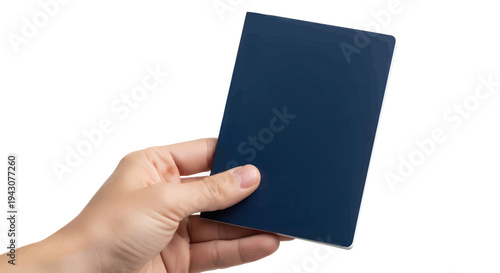 Hand holding a dark blue passport or notebook