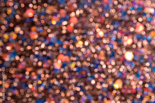 Tableau sur toile Background with many bright lights with bokeh effect and soft shades of blue, yellow, and red