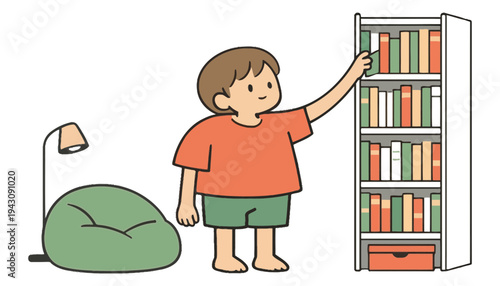 A boy reaches for a book on a tall bookshelf beside a beanbag