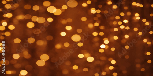Abstract golden bokeh background with bright glowing defocused lights and sparkling festive holiday atmosphere