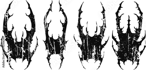 Black claw prints set with grunge texture animal paw silhouettes in worn distressed wildlife marks isolated on white