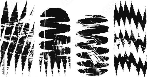 Grunge black scratch and claw marks set with torn ripped texture isolated on white background