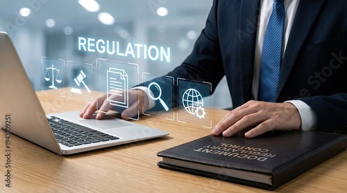 Businessman working on laptop with REGULATION text and legal icons.