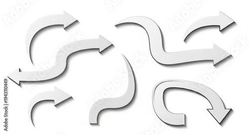 Collection of White Arrows Pointing in Various Directions.
