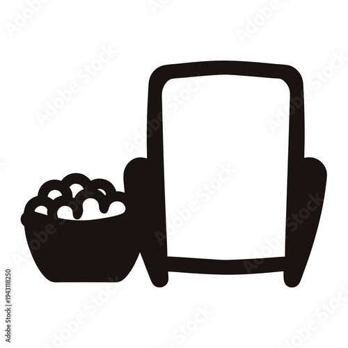 Cozy night in armchair with popcorn bucket, perfect for relaxation time