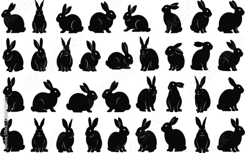 Black silhouettes of rabbits in various poses on white background animals