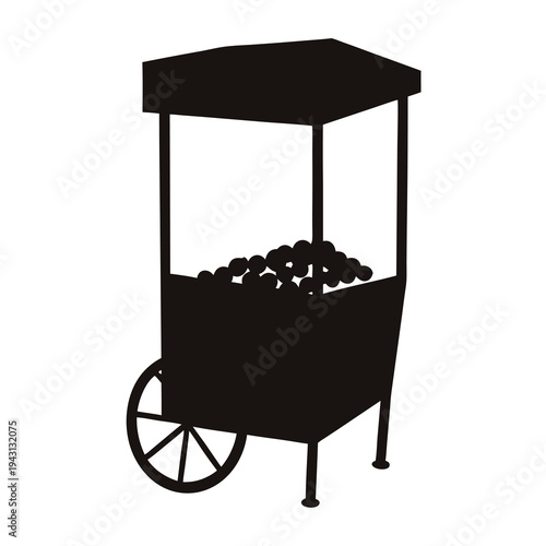 Silhouette of a vintage popcorn cart, ready to sell delicious snacks