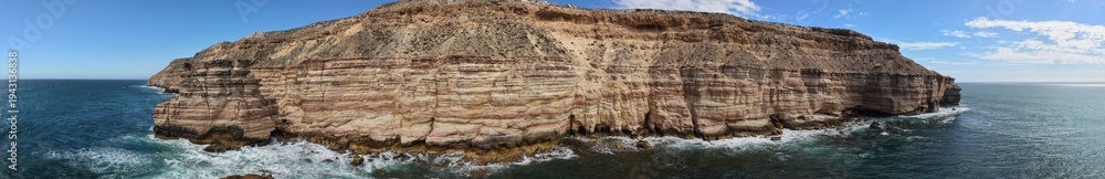 custom made wallpaper toronto digitalAerial shot of Island Rock sculpted by fracturing and decaying of the cliffs offering the Viewer from Island Rock Lookout some precarious rock formations, Kalbarri Natinal Park, Western Australia.