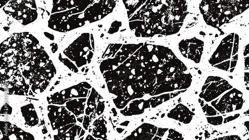 Black and white abstract terrazzo pattern with irregular stone fragments and cracks design